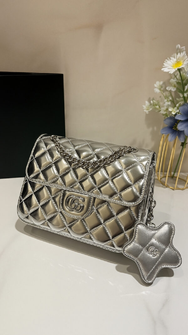 Chanel Metallic Silver Backpack
